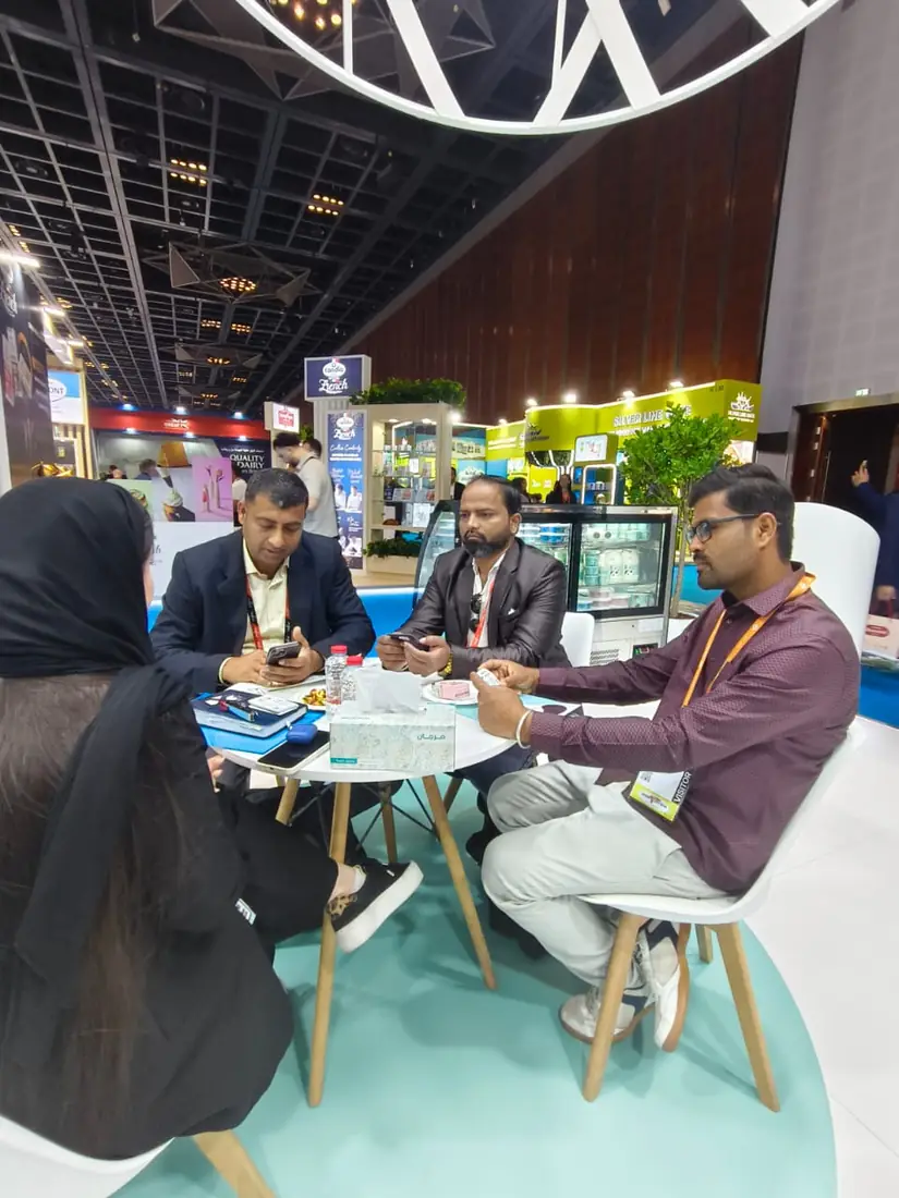Business meeting at an exhibitor stand